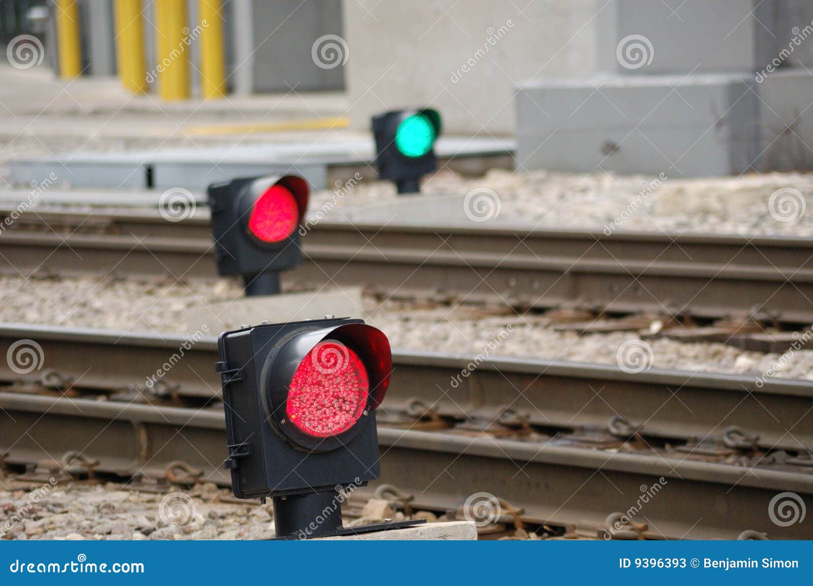 Small LED train signals along the tracks.