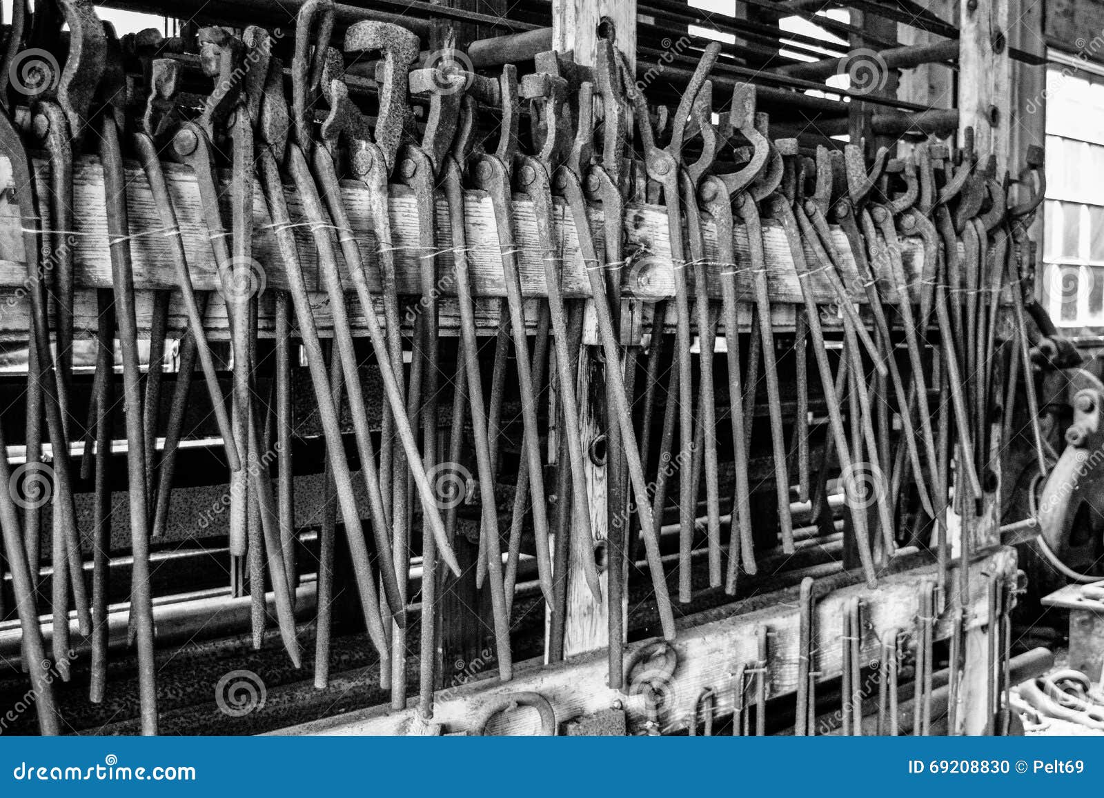 Train track tools. Racks of tools used on train tracks in black and white.