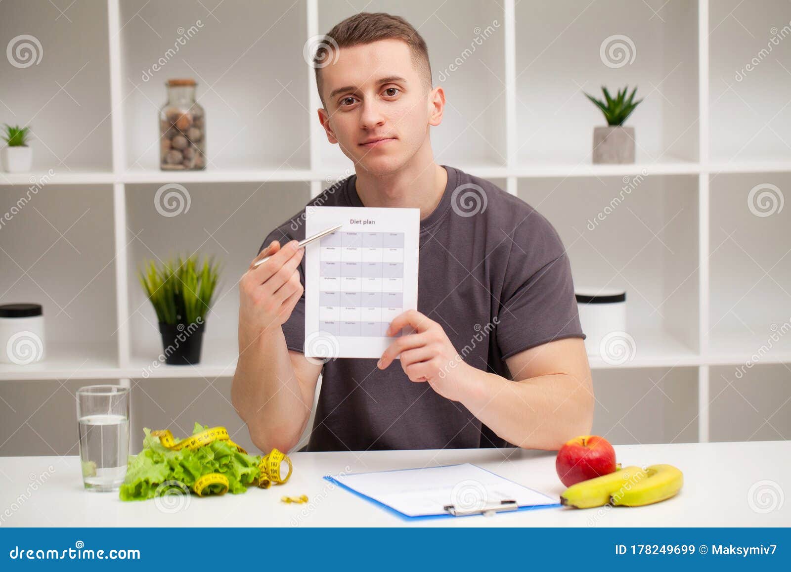 Trainer Draws Up a Training Program and a Healthy Diet Plan Stock Image Image of fitness