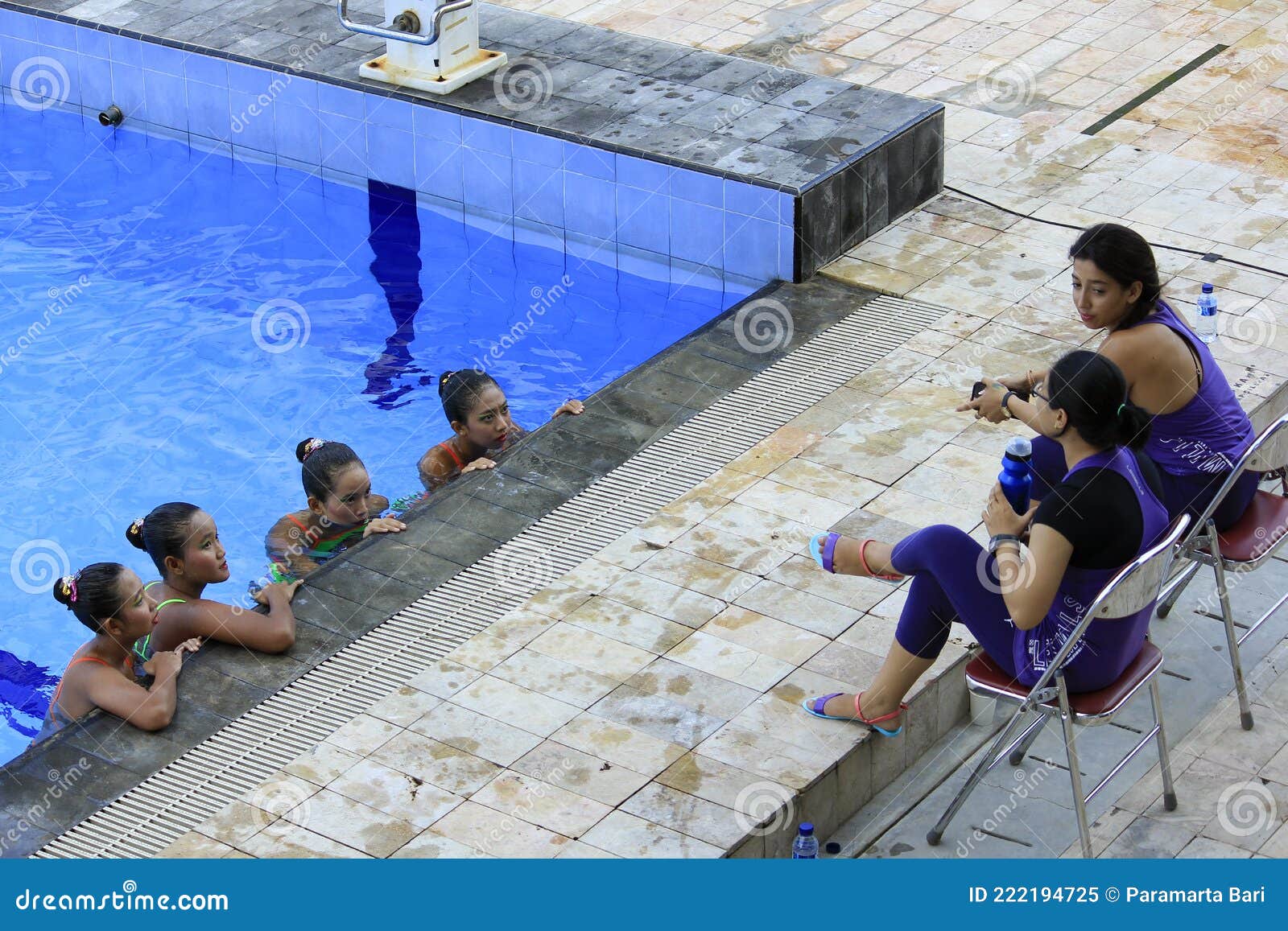 Five Swimmers Racing Against Each Other In A Swiming Pool Editorial
