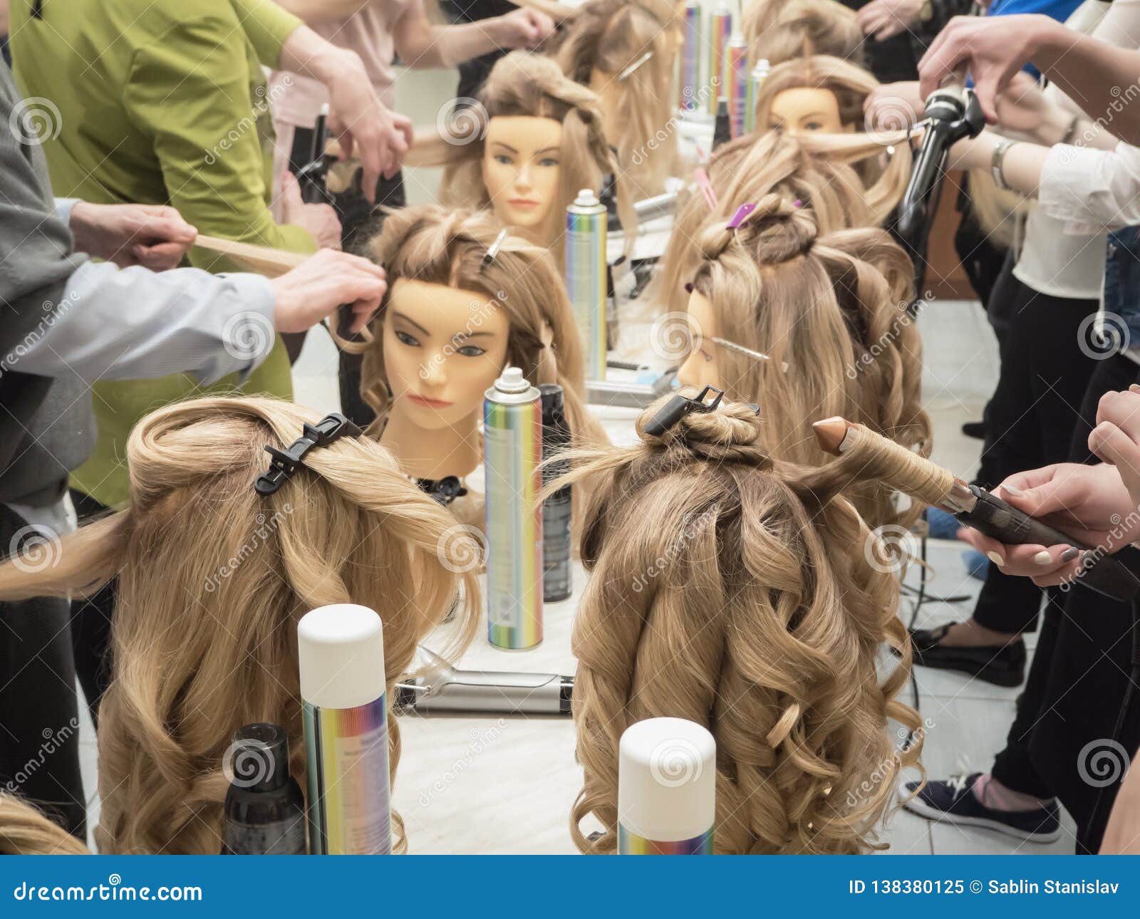 Training Hairstyles On The Mannequin Teamwork Stock Image