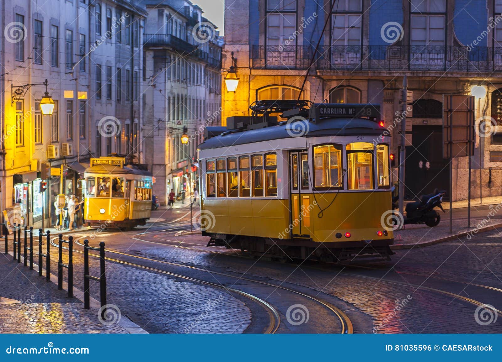 tram car on street at evening in lisbon, portugal