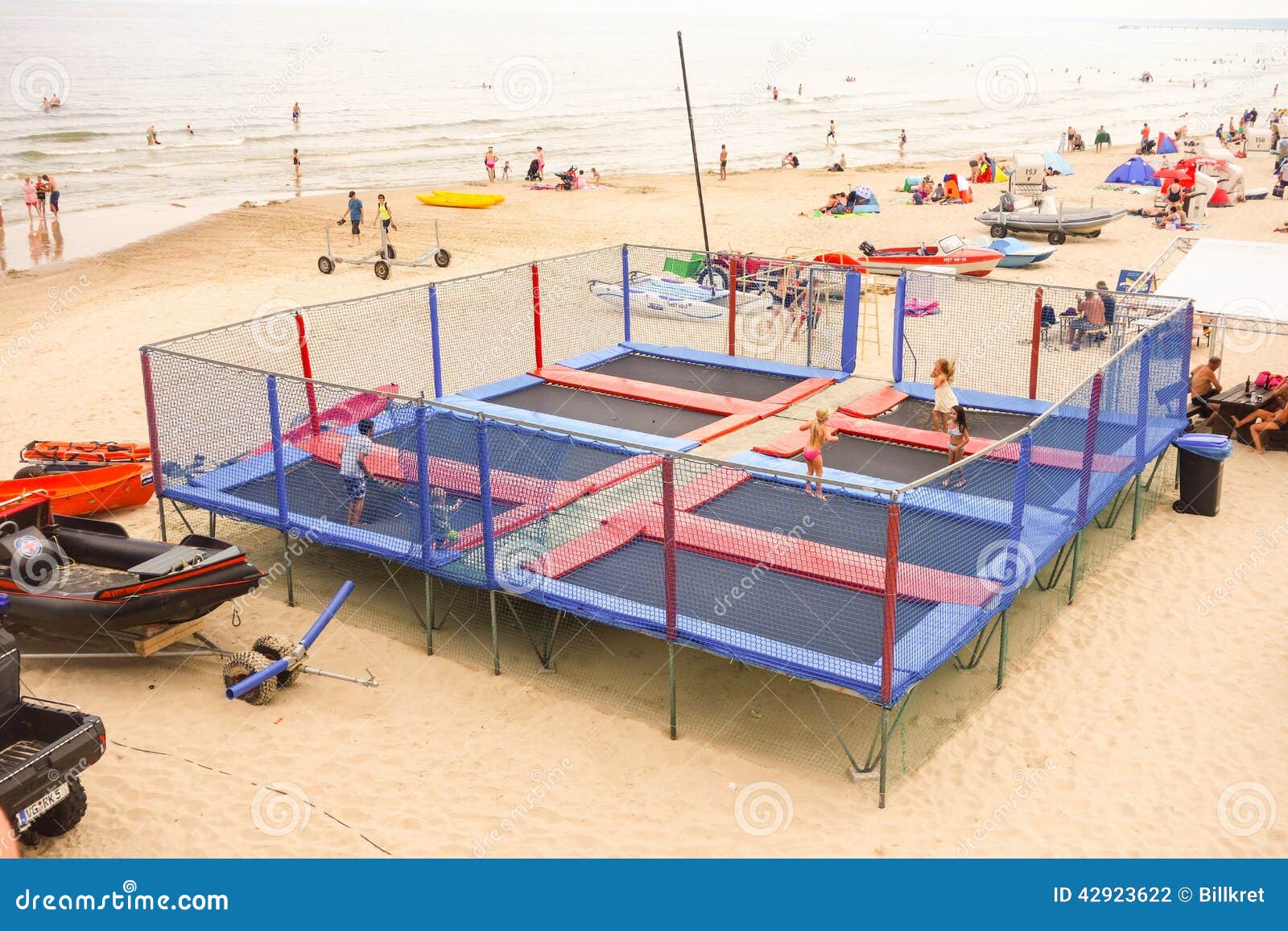 Trampoline on the beach editorial photography. Image of bouncing 42923622