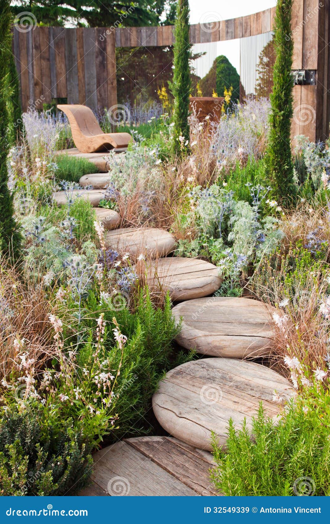 Tranquil garden with wooden steps and seats