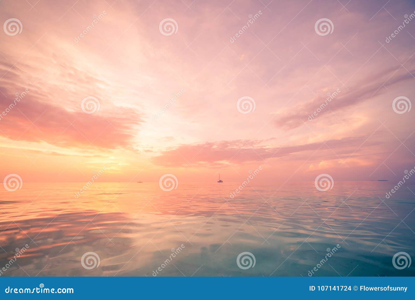 relaxing and calm sea view. open ocean water and sunset sky. tranquil nature background. infinity sea horizon
