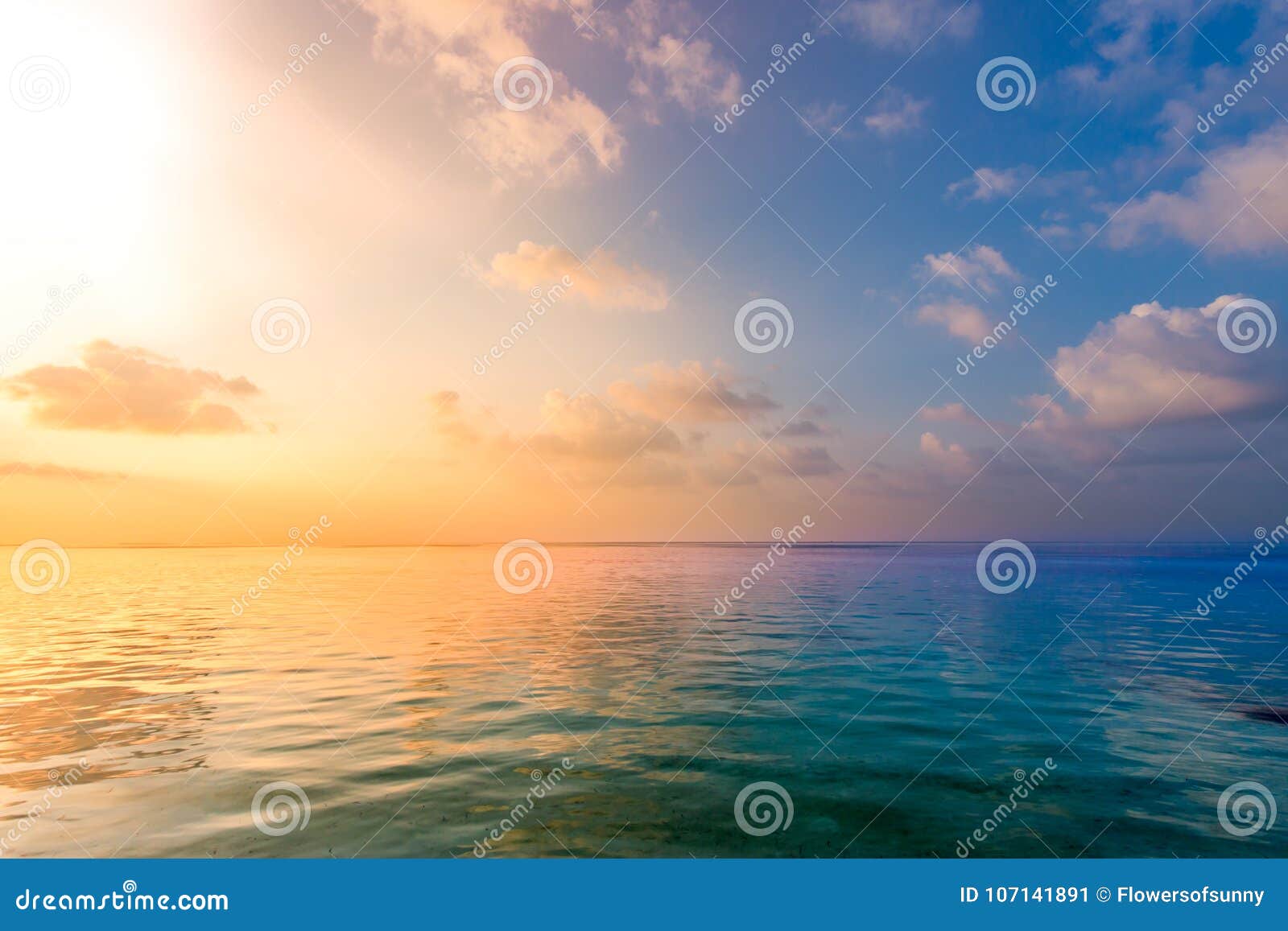 relaxing and calm sea view. open ocean water and sunset sky. tranquil nature background. infinity sea horizon