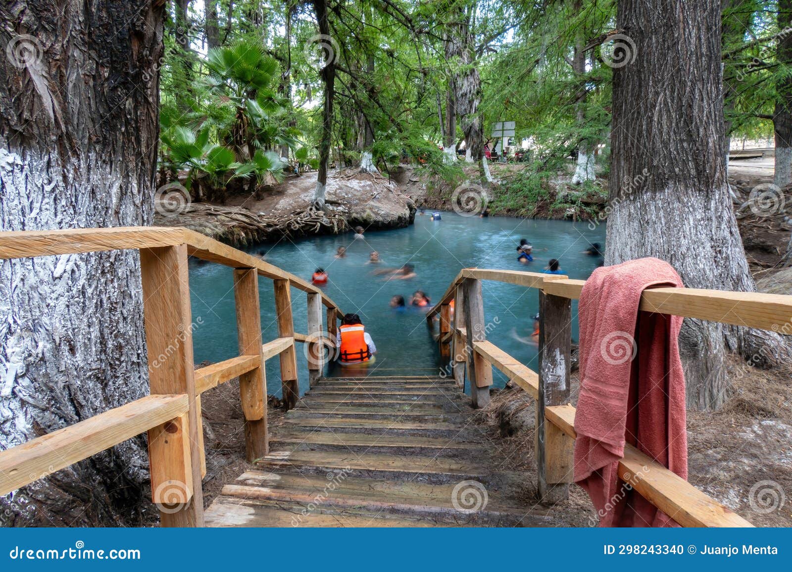 tranquil waters of media luna lake, san luis potosi