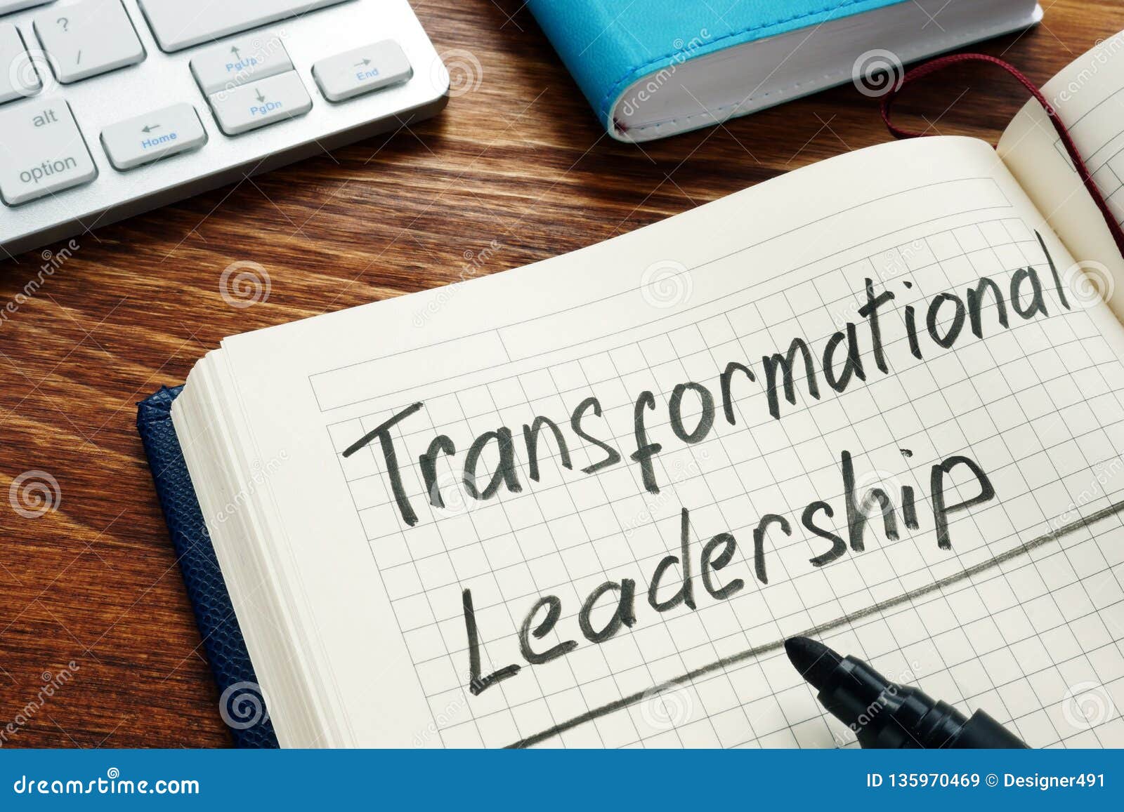 transformational leadership handwritten in the notepad