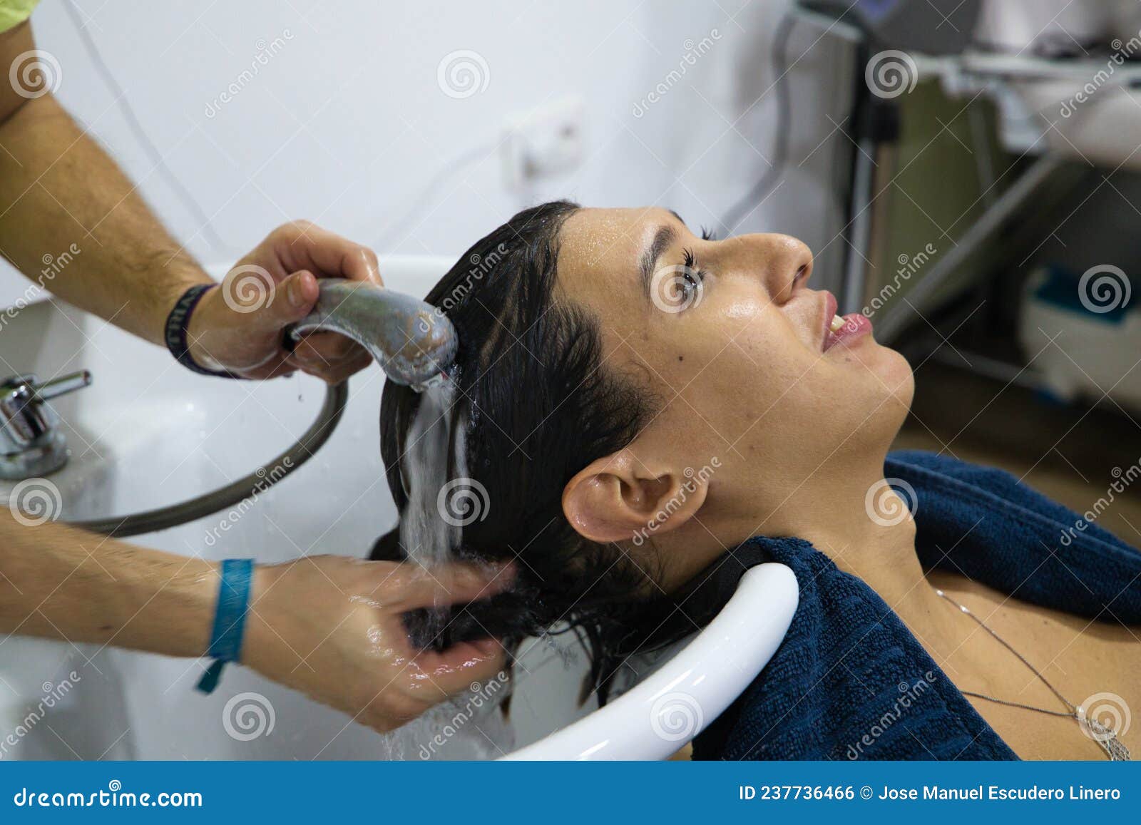 Transgender Woman Lying Down Having Her Head Hair Washed in Beauty Salon by  Professional Hairdresser. Beautiful Client Feeling Stock Photo - Image of  cosmetics, hairstyle: 237736466