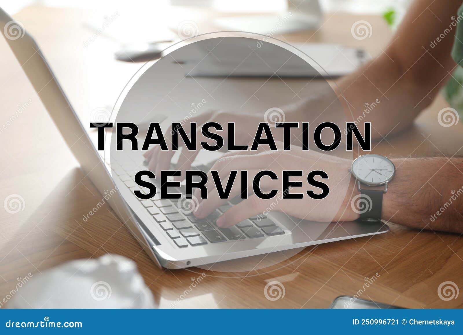 translation services. man working on laptop at table indoors, closeup