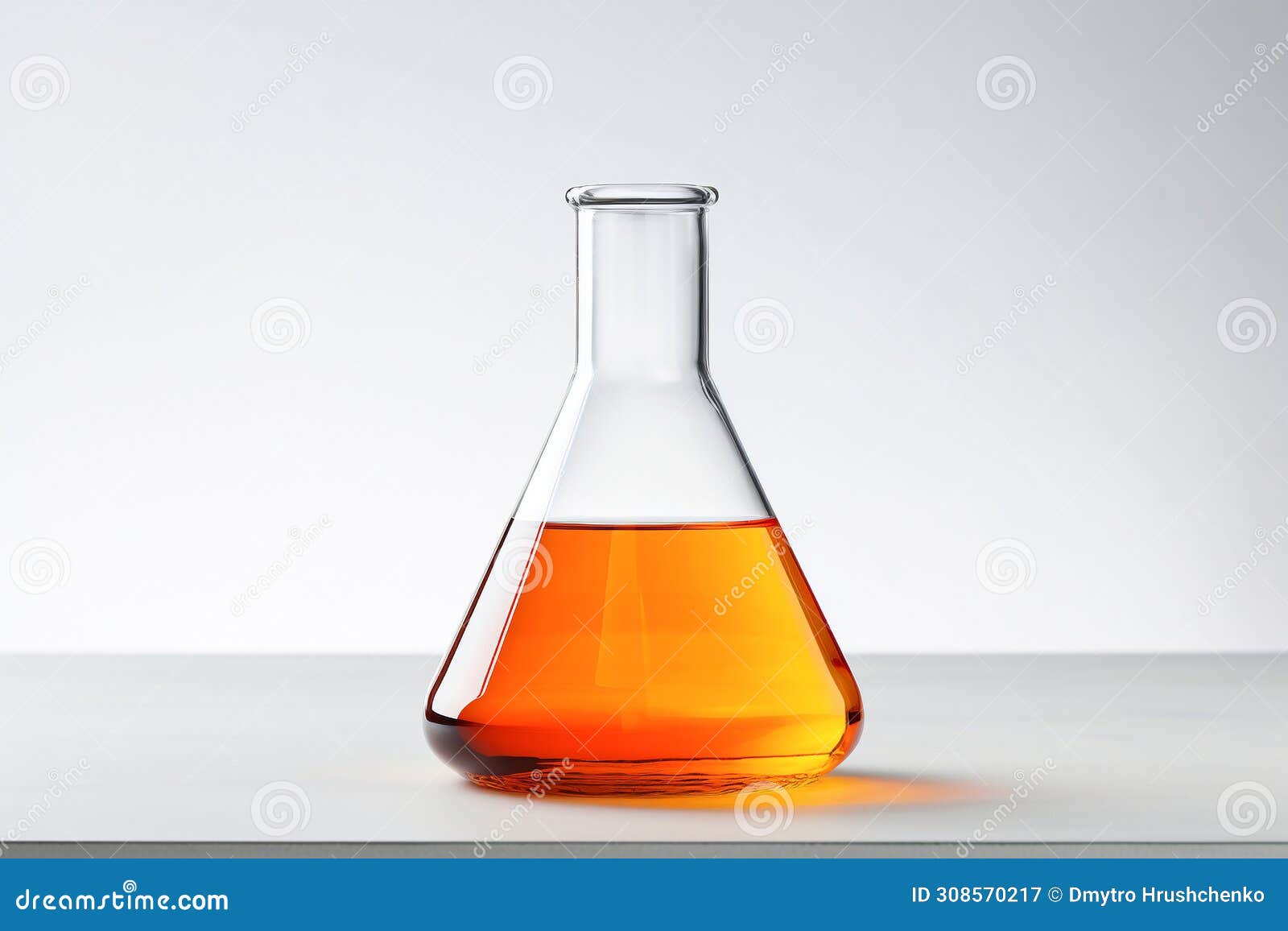 transparent chemicals in lab flask on a white table. scientific experimentation setup for research and analysis.