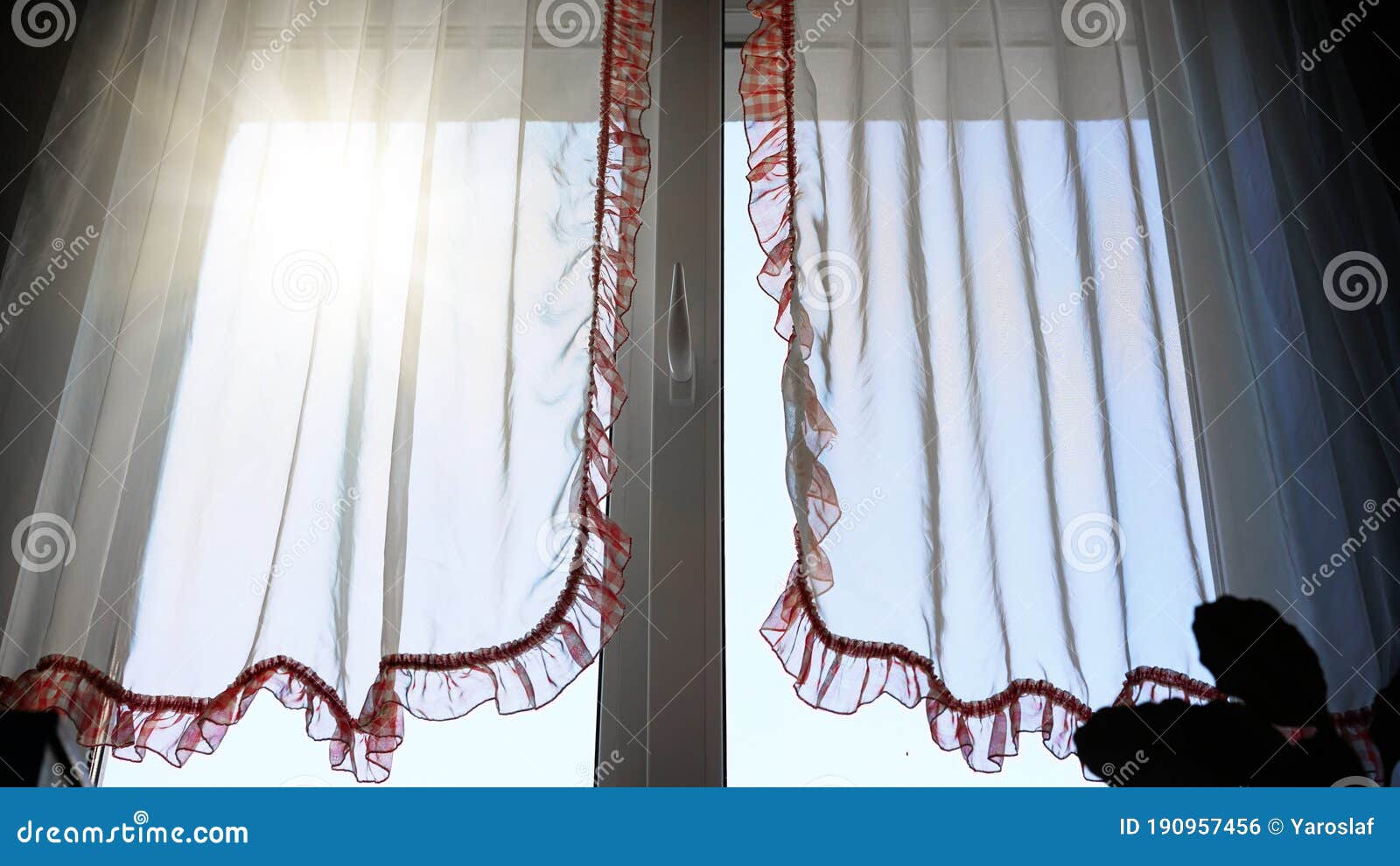 Transparent Curtains with Frills on Window at Back Sunlight Stock Photo