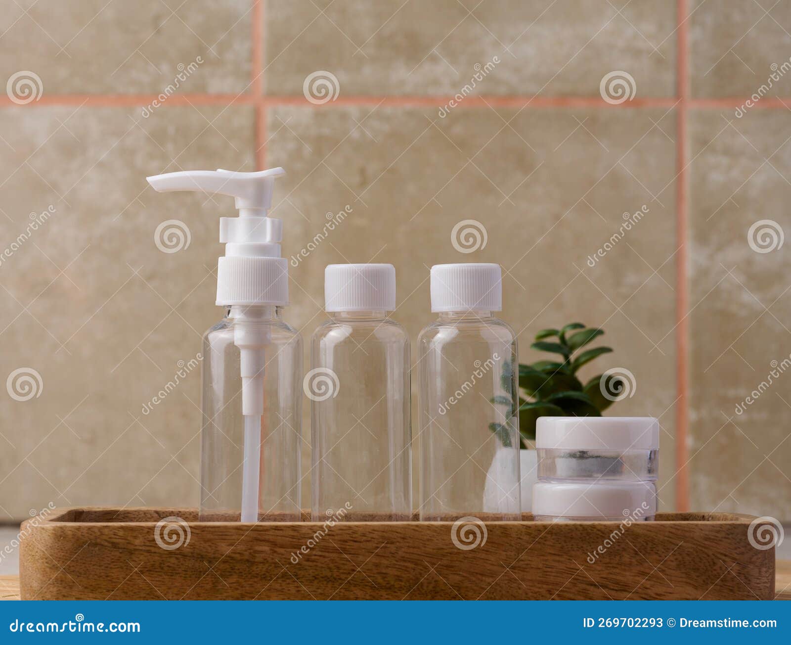 Transparent Plastic Container for Cosmetics on the Table, Bottles for