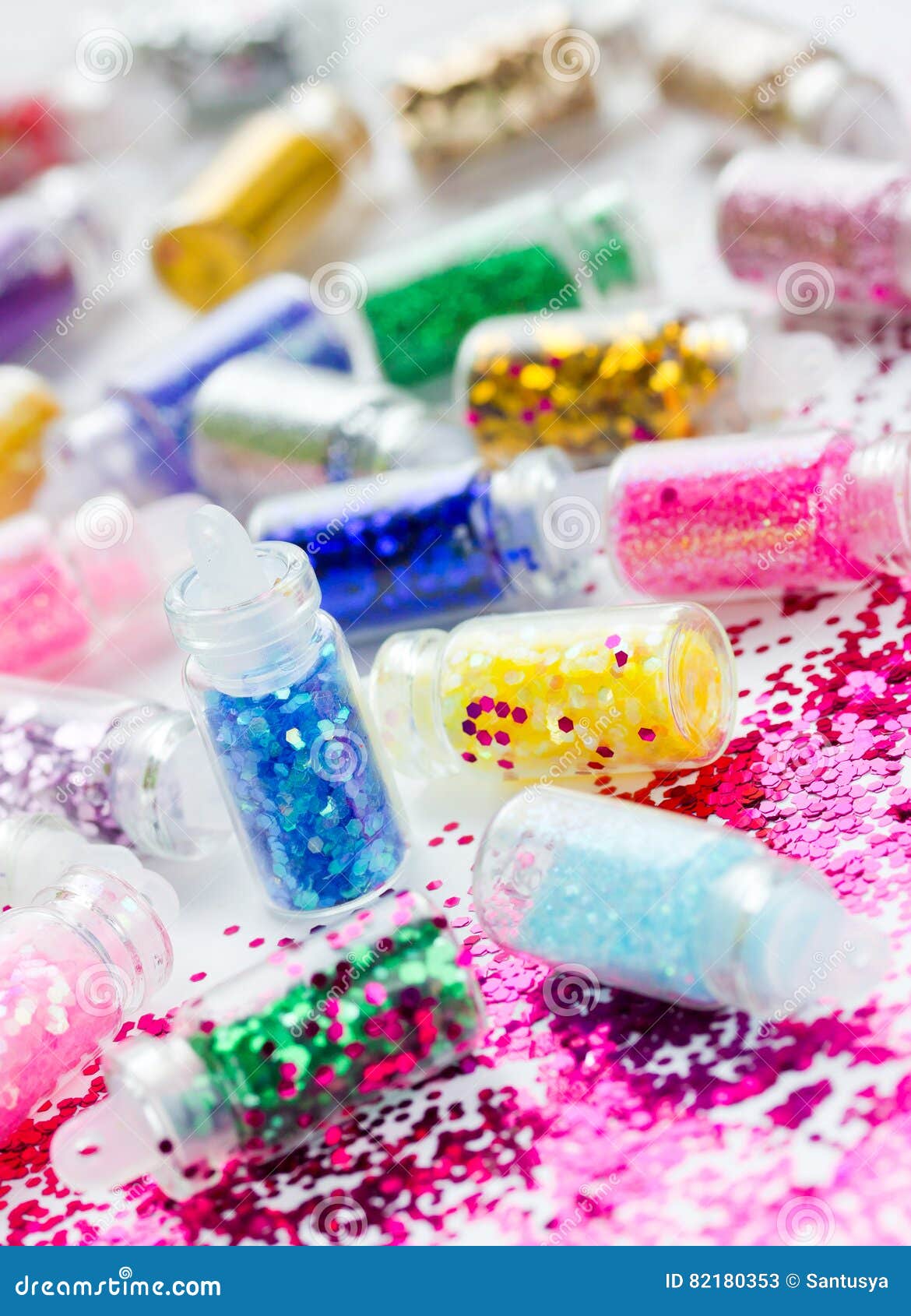Transparent Small Bottles with Glitter Makeup and Nail Art Stock Image