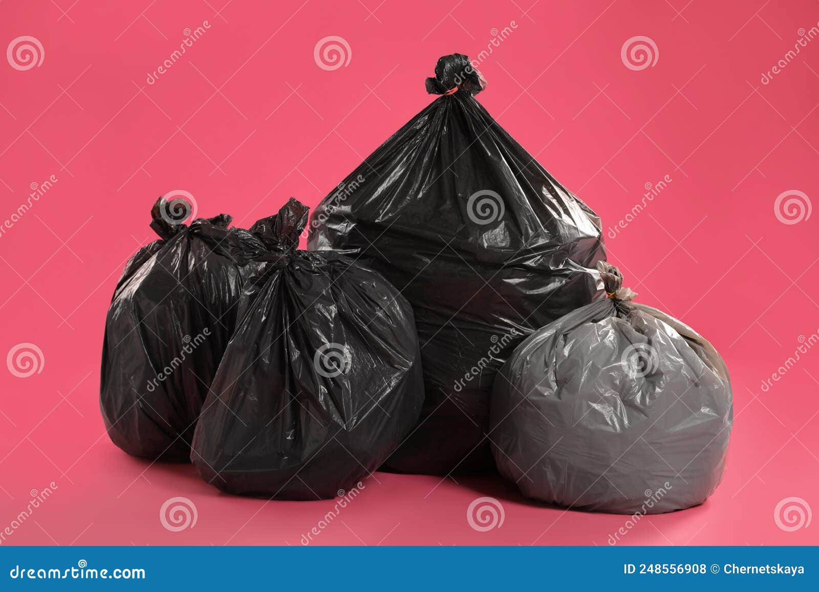 Trash Bags Full Garbage Pink Background Stock Photo by ©NewAfrica 567530180