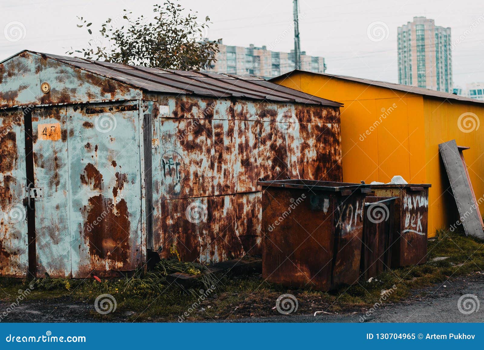 Trash Can in the Garage Parking Stock Image - Image of dirty