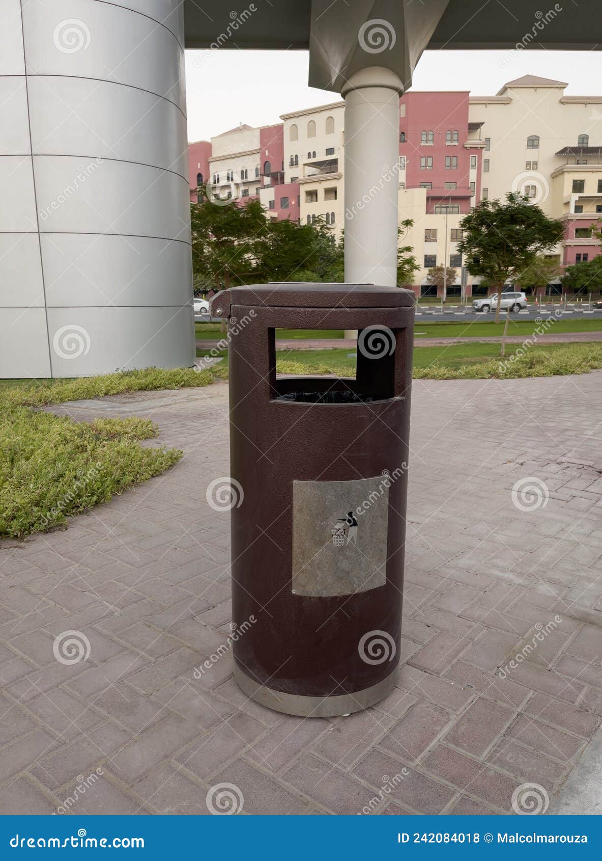 Trash can on the street stock photo. Image of object 242084018