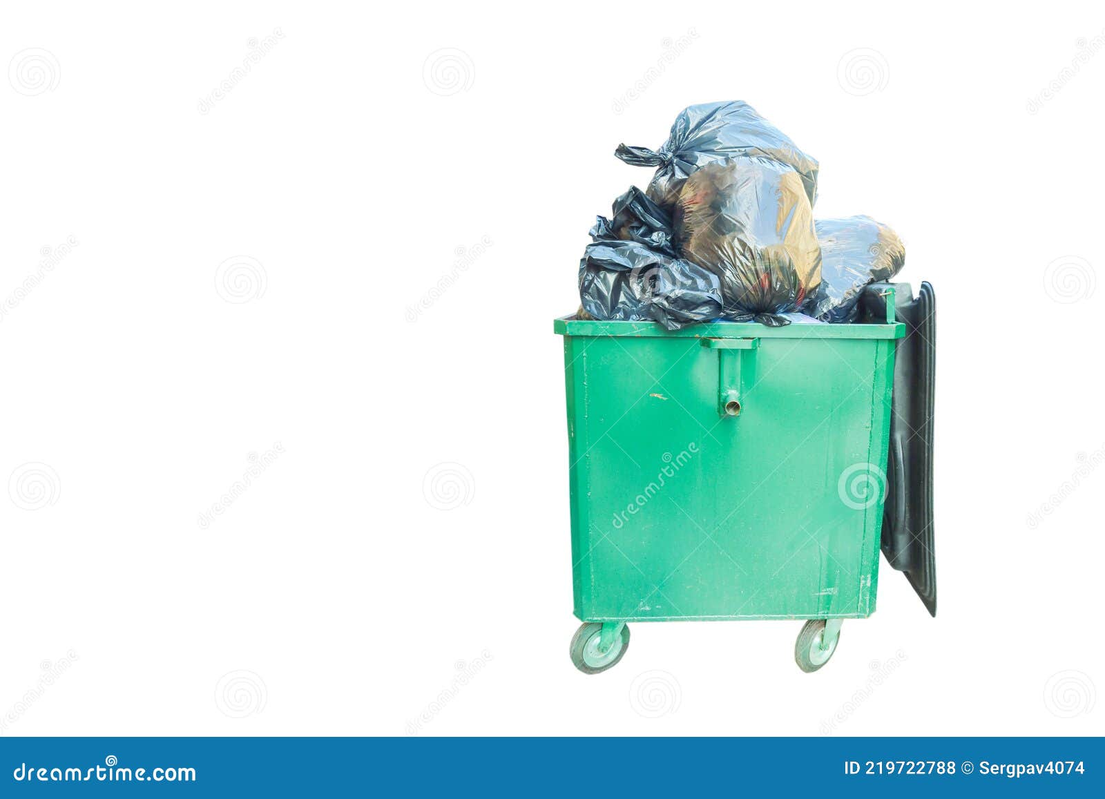 Trash Can, on Wheels, Filled with Garbage Bags Stock Photo - Image