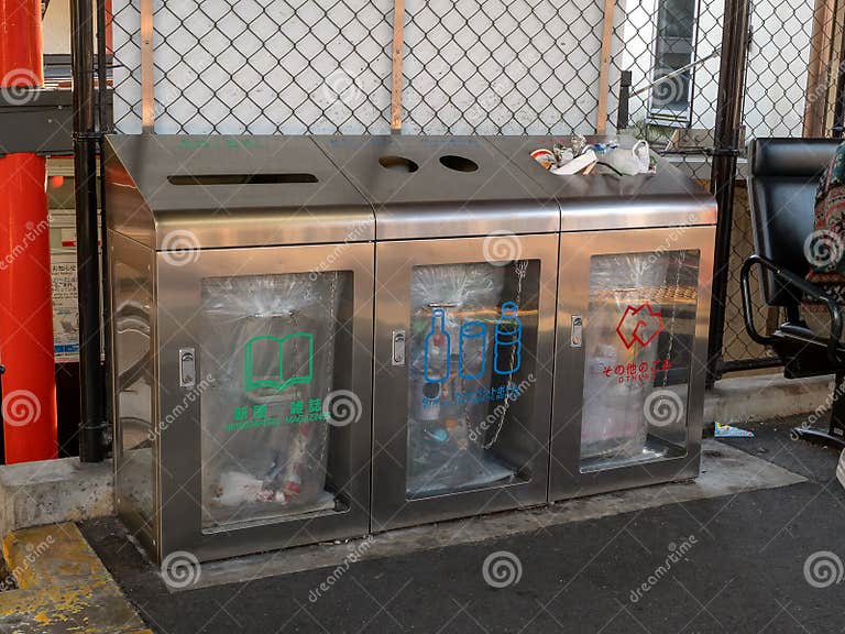 Trash in Garbage Cans with Sorted Garbage in Japan Stock Photo Image