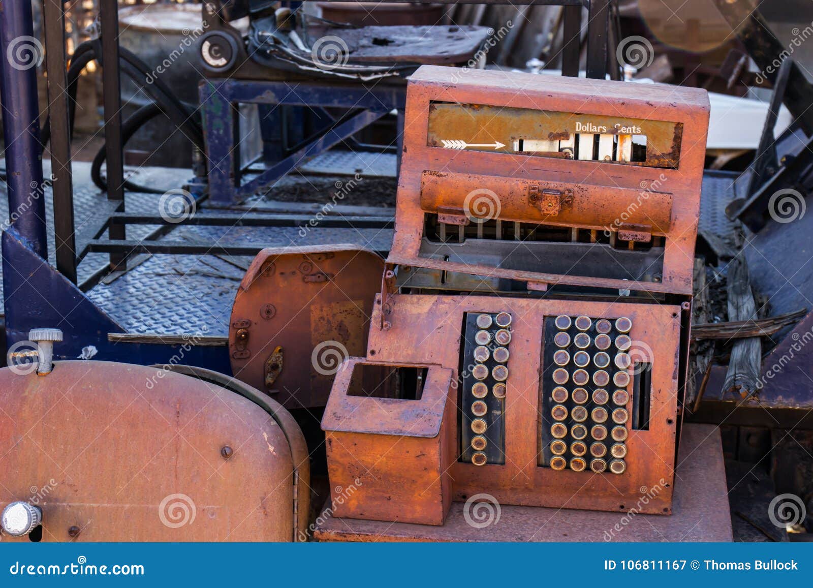 trashed broken rusty cash register