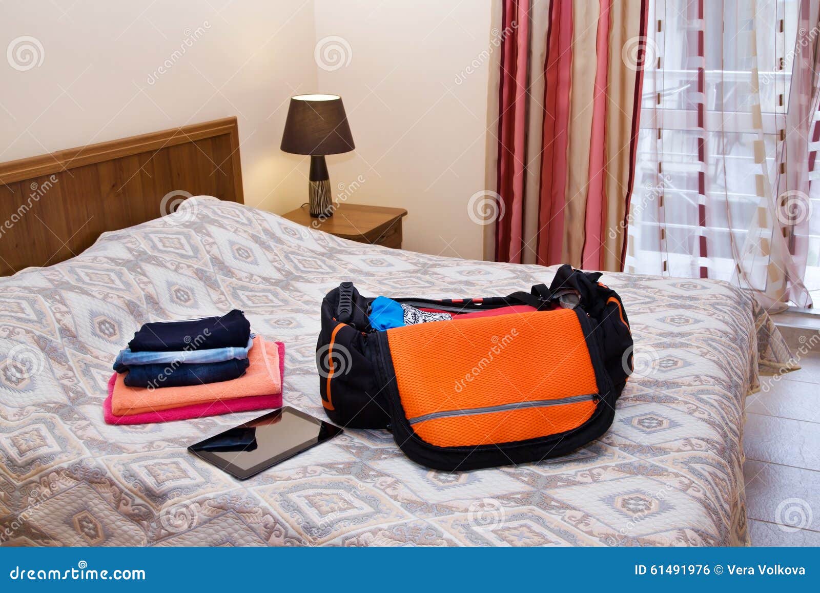 Cropped View Of Man Packing Clothes Into Travel Bag Stock Photo, Picture  and Royalty Free Image. Image 114774181.