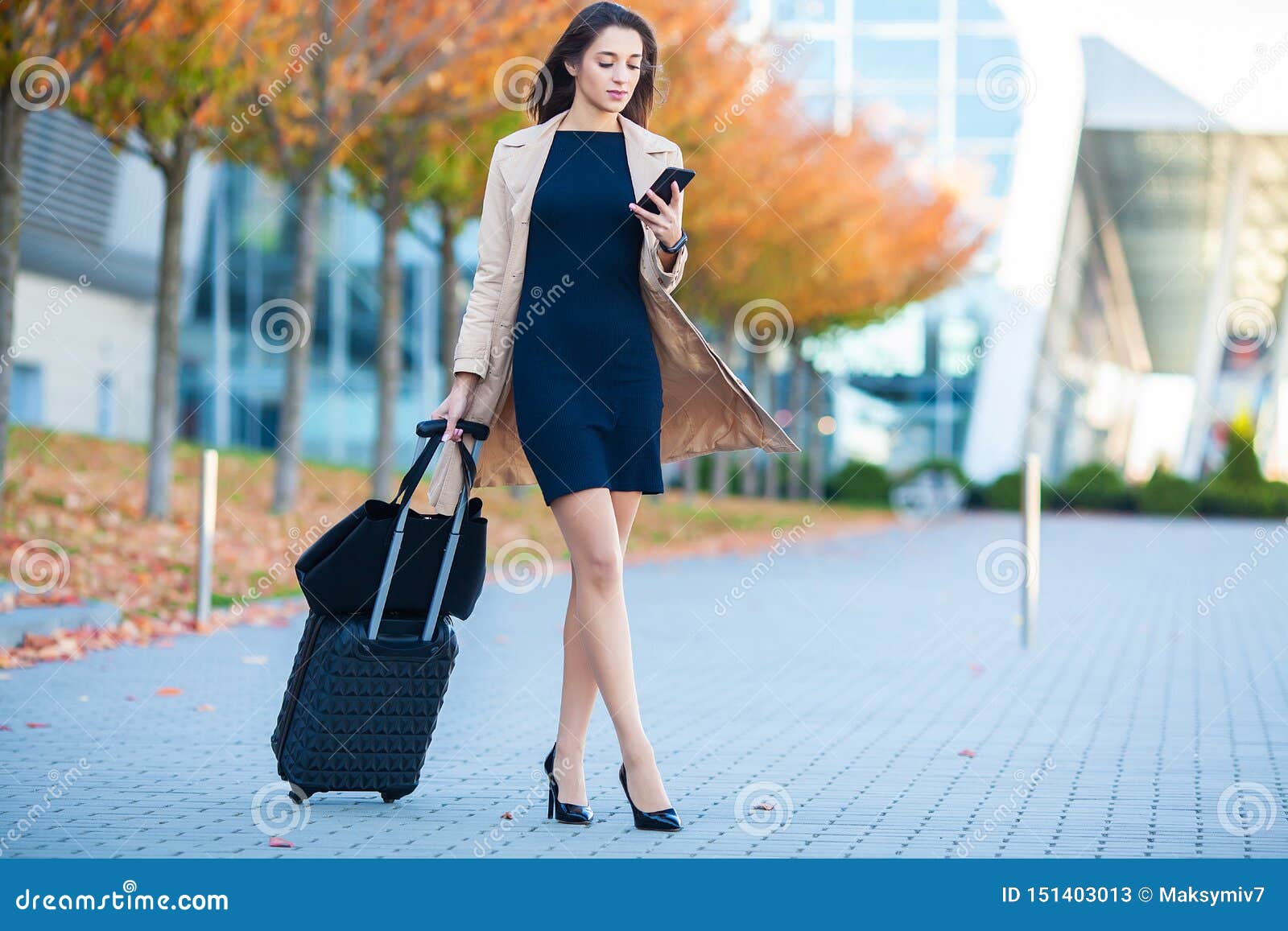 Travel. Business Woman in Airport Talking on the Smartphone while ...