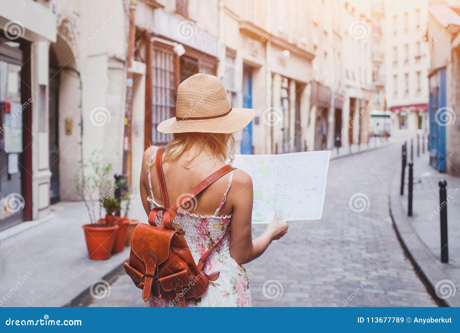 travel guide, tourism in europe, woman tourist with map