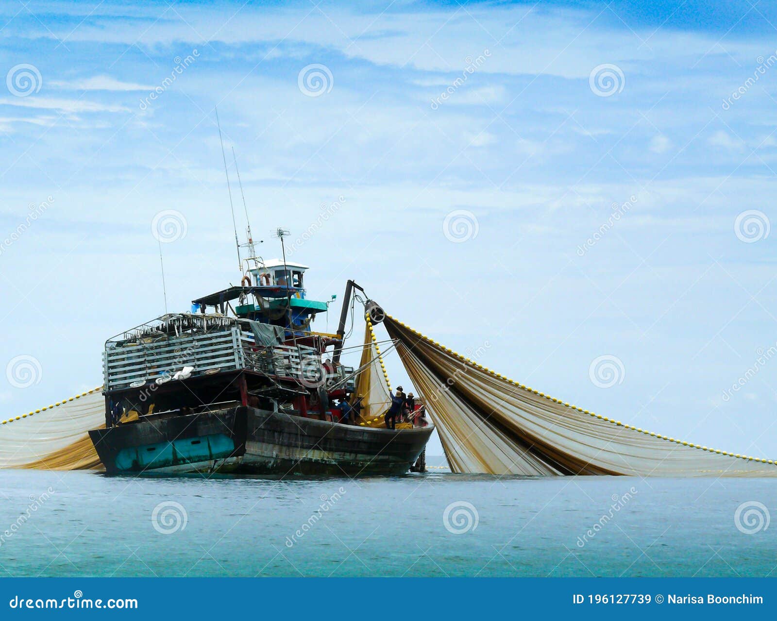 A Large Fishing Boat in the Middle of the Sea. Stock Image - Image of  beautiful, background: 196127739