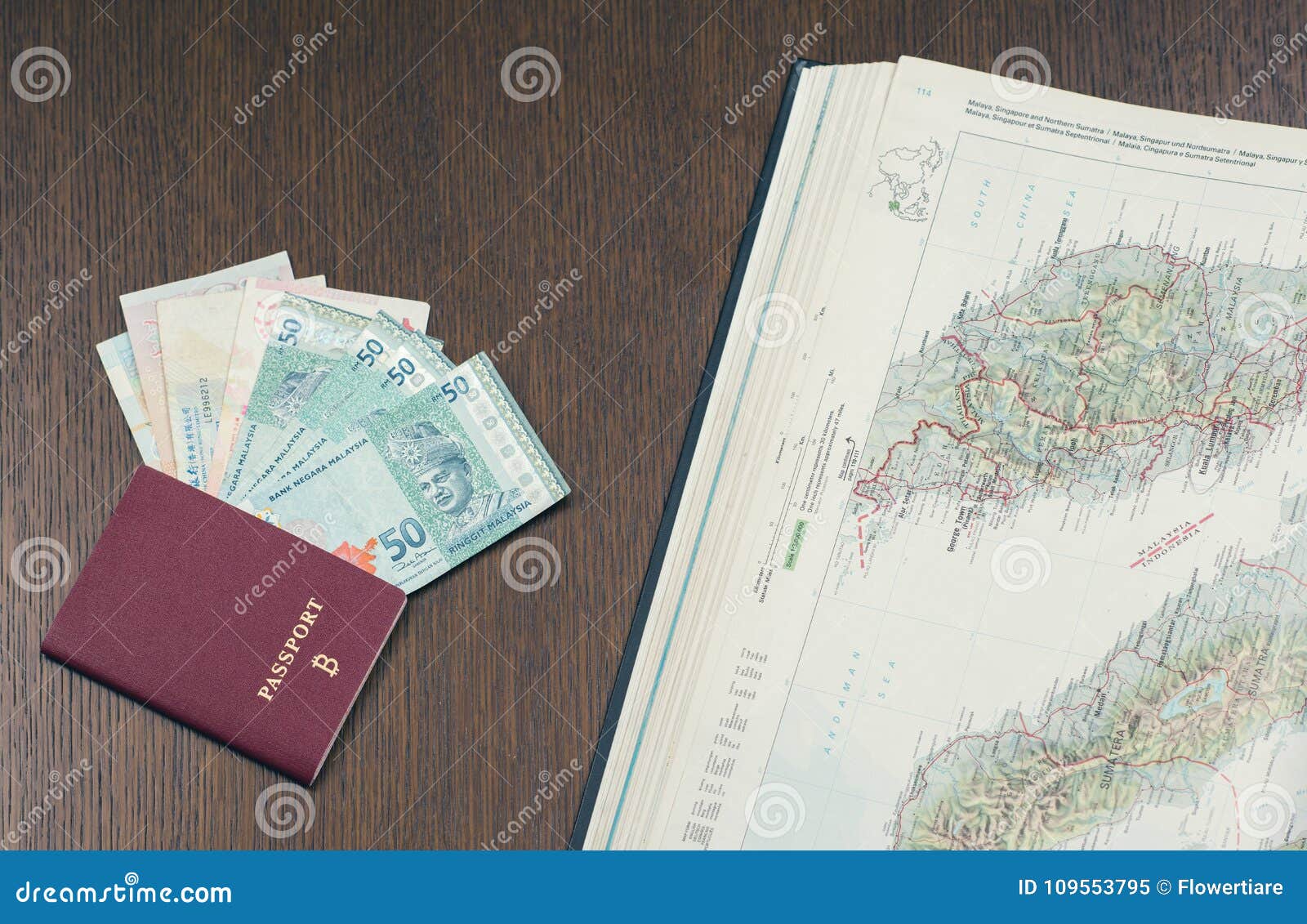 Travel Passport With Bitcoin Sign A Bundle Of Malaysian Money And A - 