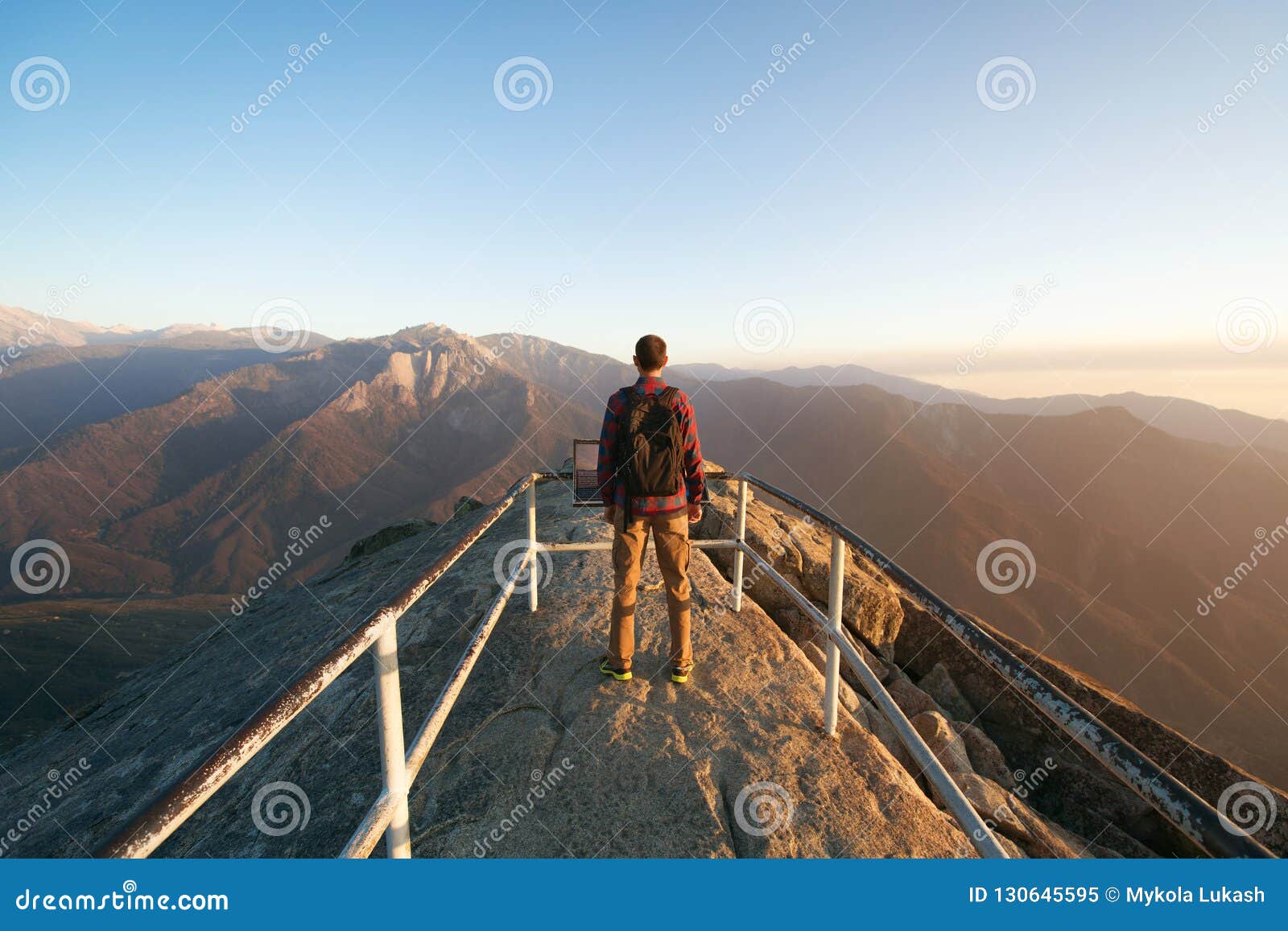 travel in sequoia national park, man hiker with backpack enjoying view moro rock, california, usa