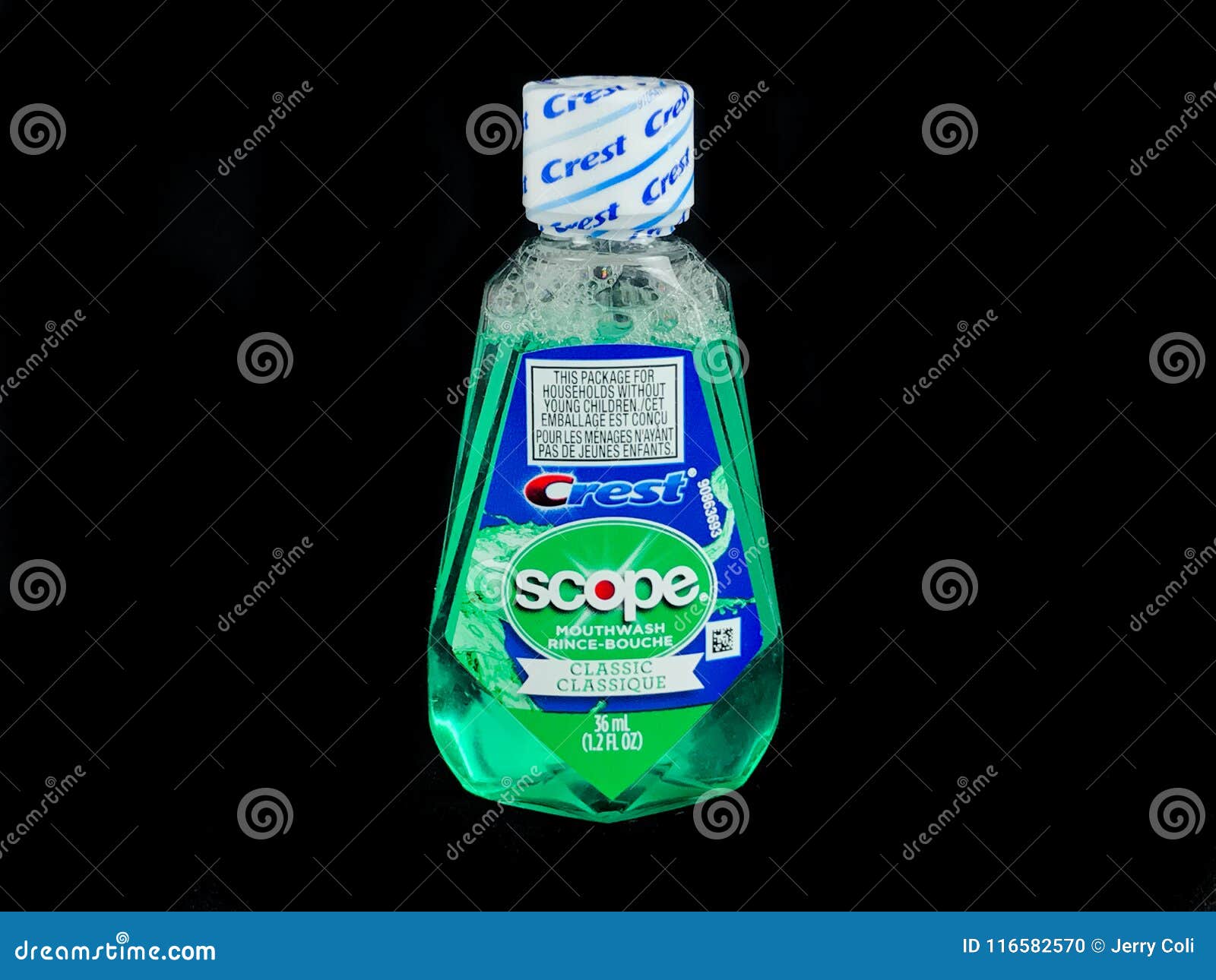 Travel Size Bottle of Crest Mouthwash on a Black Backdrop Editorial