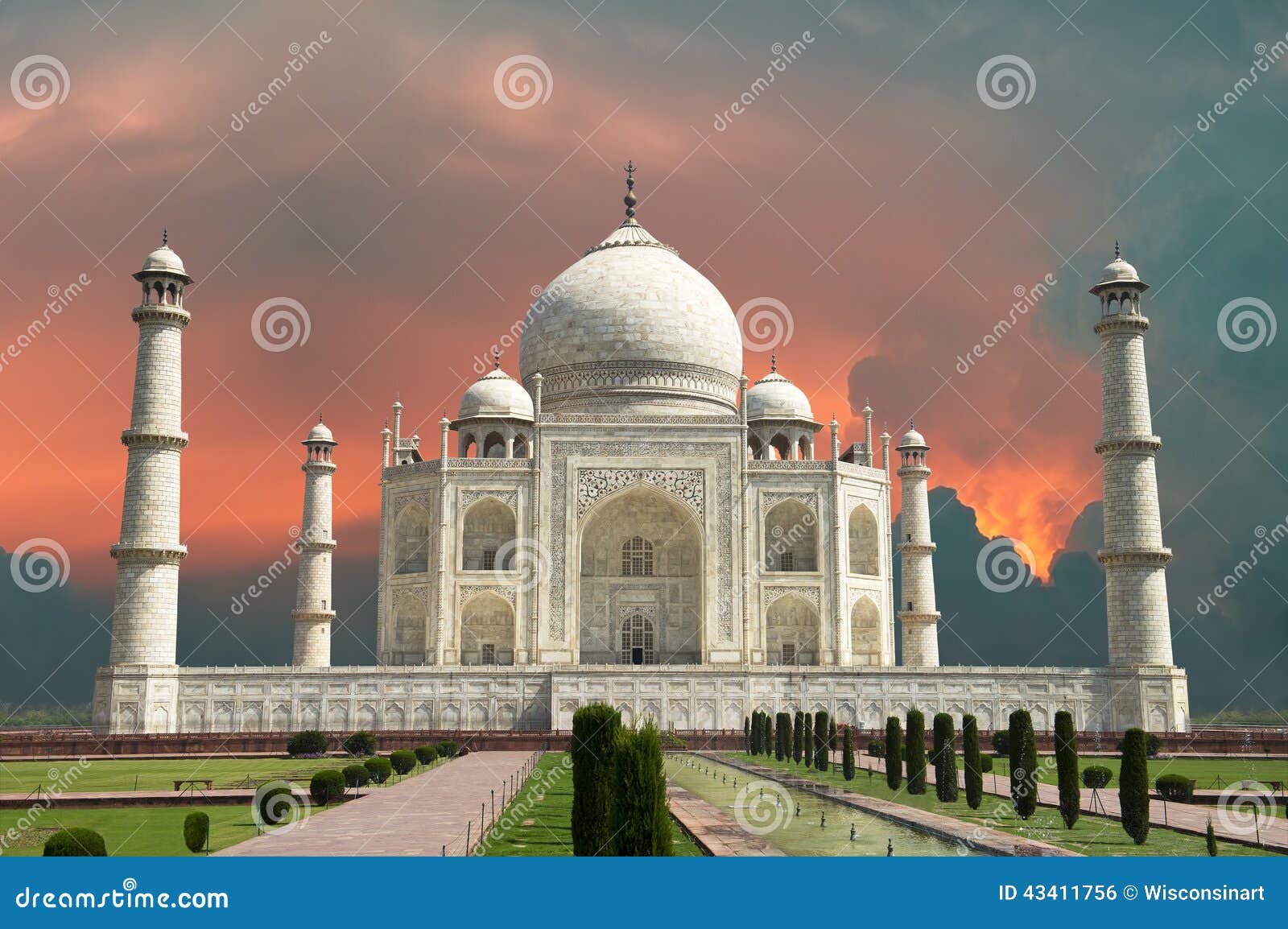 travel to agra, india, taj mahal and red stormy sky