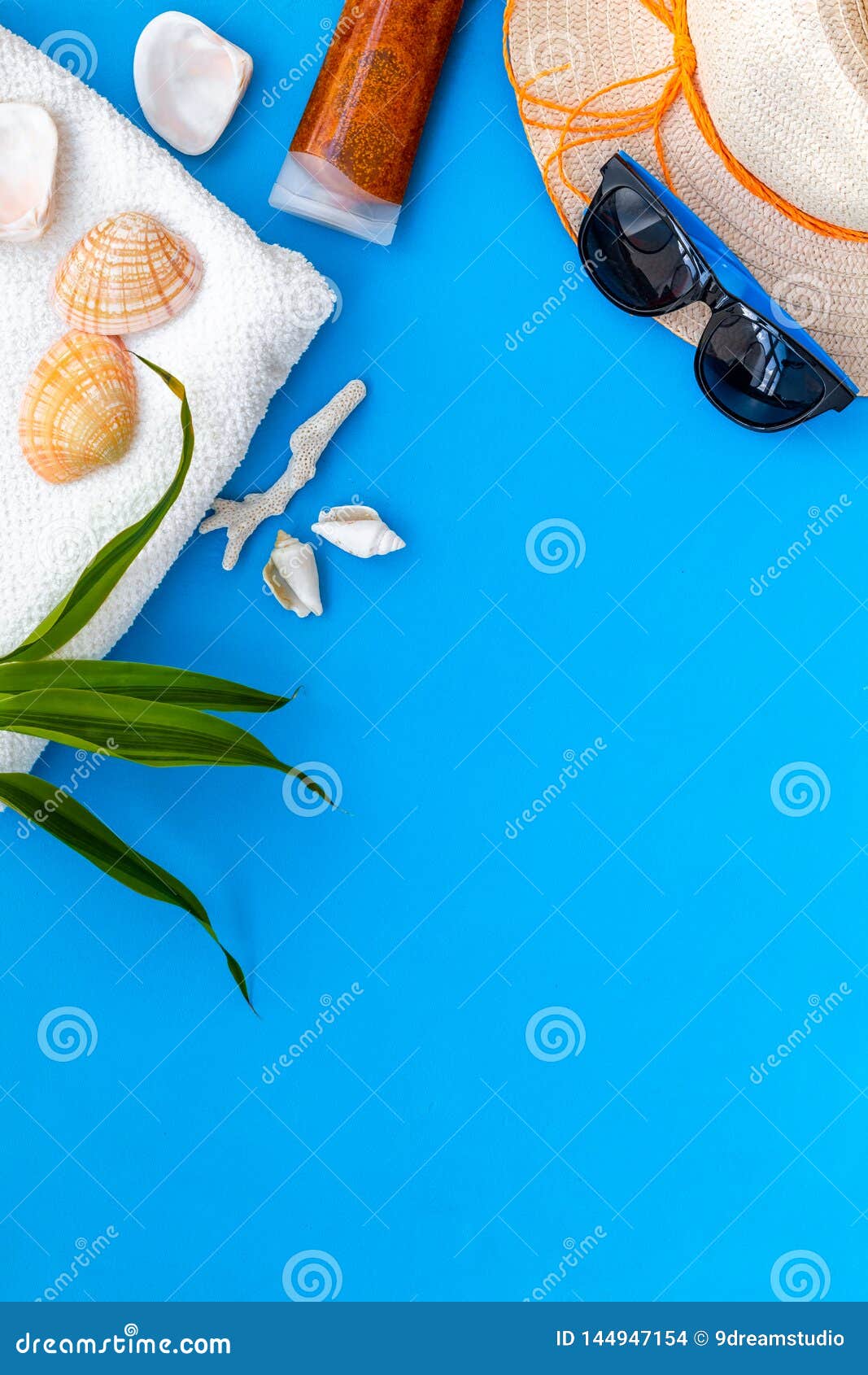 Straw Hat, Sun Glasses, Shells and Sunblock Cream for Sea Vacation on ...