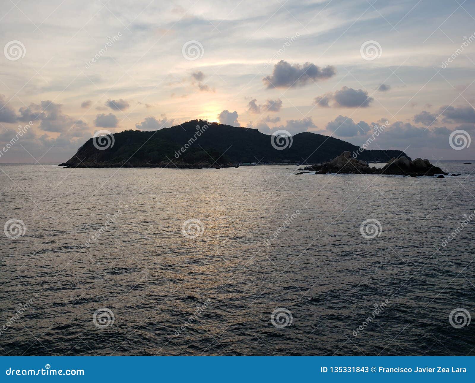 landscape with the island of la roqueta in acapulco at dusk