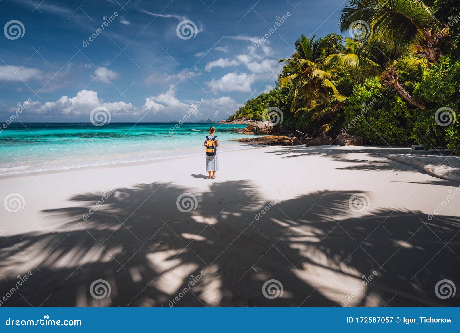 Travel Tourist Female Enjoy Exotic Tropical Beach With Palm Trees And