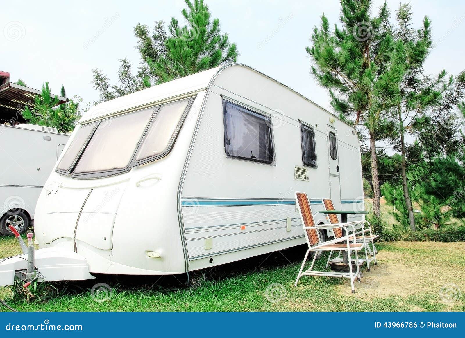 Travel Trailer with Chair in the Nature Stock Photo Image of beach