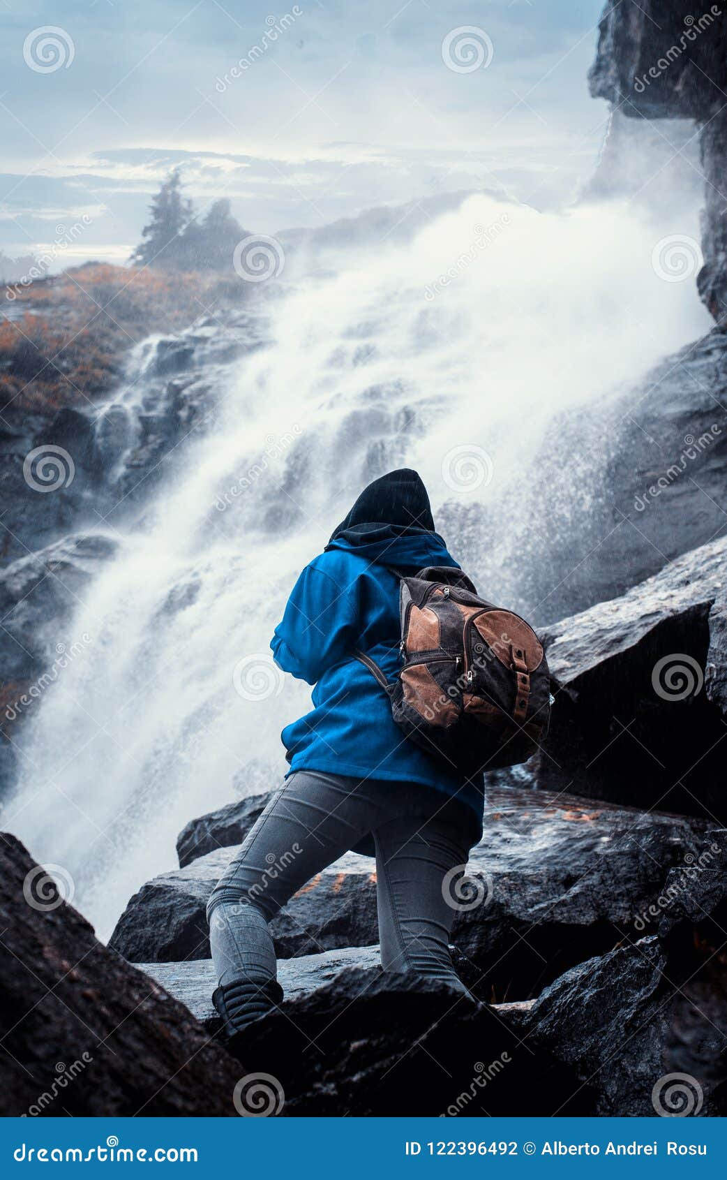 climbing on a waterfall