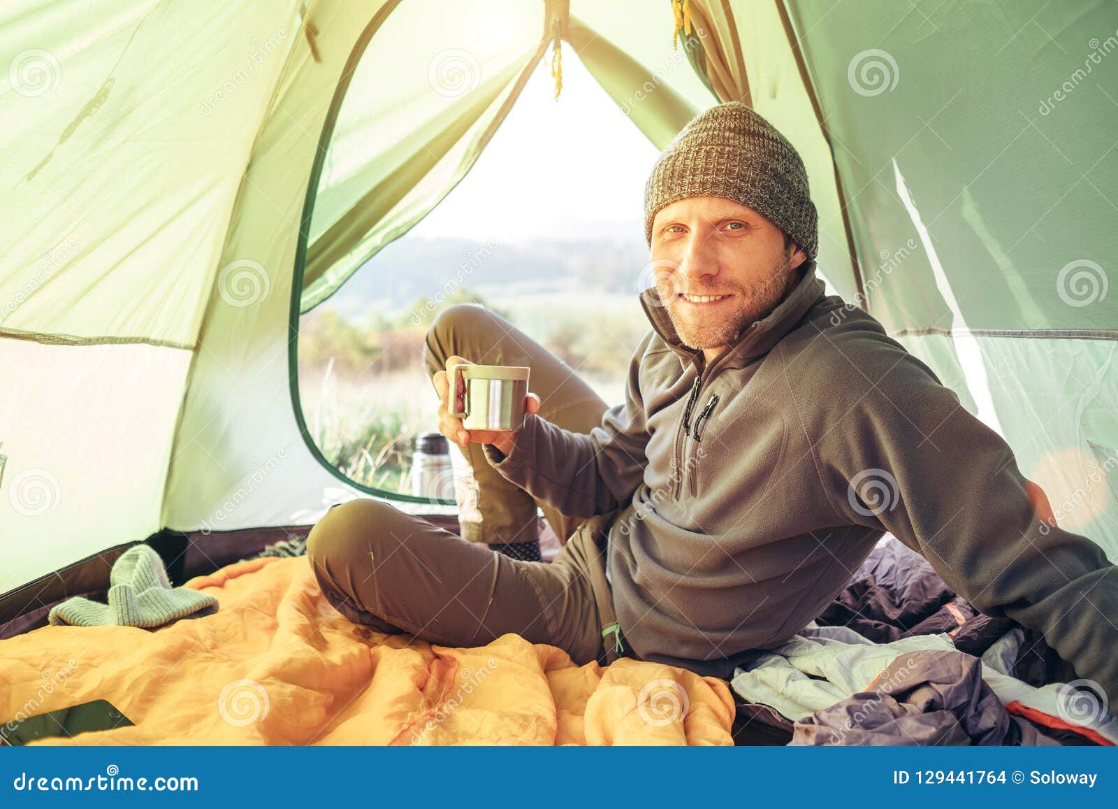 Traveler Man Meet Morning in Camping Tent with Cup of Tea Stock Photo ...