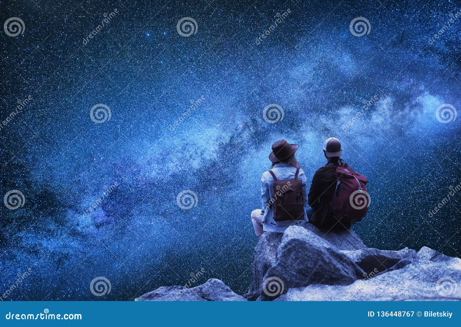 travelers couple look at the stars. travel and active life concept with team.