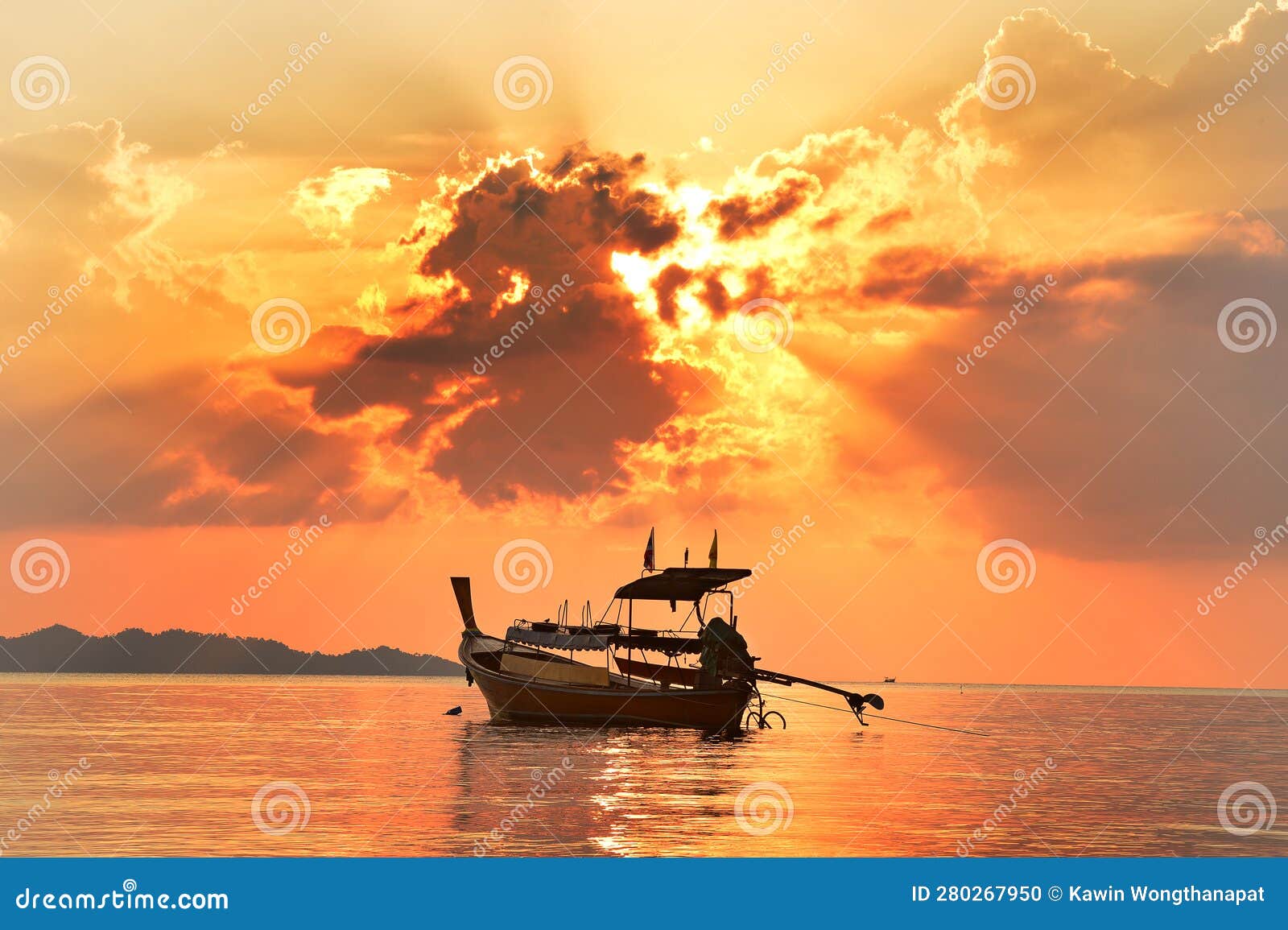 traveling empty thai longtail boat under golden sun rays