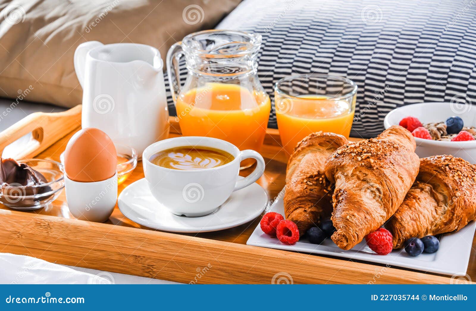A Tray with Breakfast on a Bed in a Hotel Room Stock Photo Image of juice, cereals 227035744
