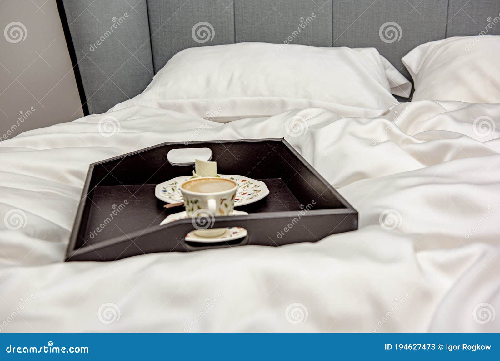 Tray with Coffee in a Large Bed in a King Size Bedroom Stock Image