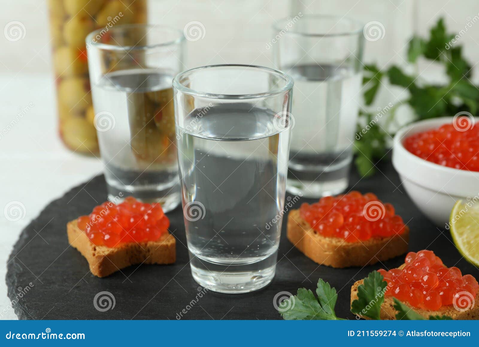 Tray with Shots of Vodka and Tasty Snacks, Close Up Stock Photo Image