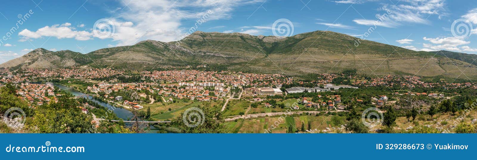trebinje town panorama view from height with river, mountains and tile roofs at background
