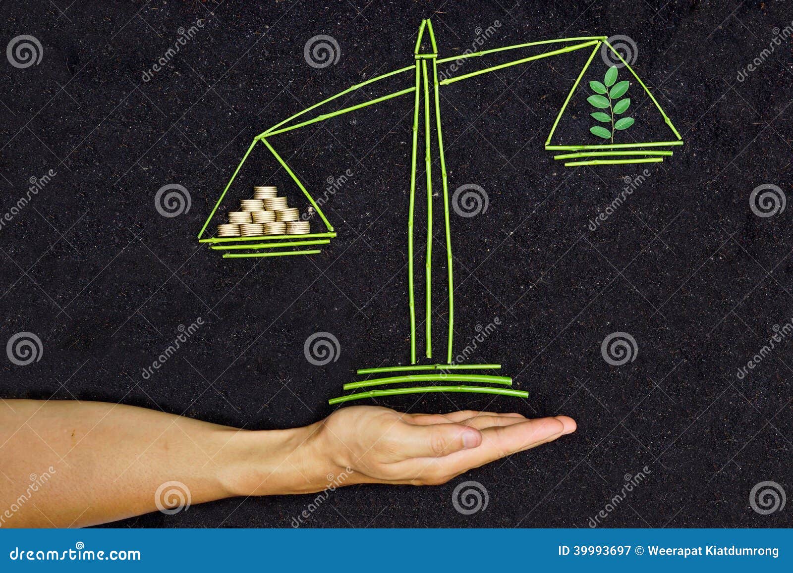 Businessman Covering Stacked Coins On Golden Weighing Scale At Wooden Table  Stock Photo, Picture and Royalty Free Image. Image 84268953.