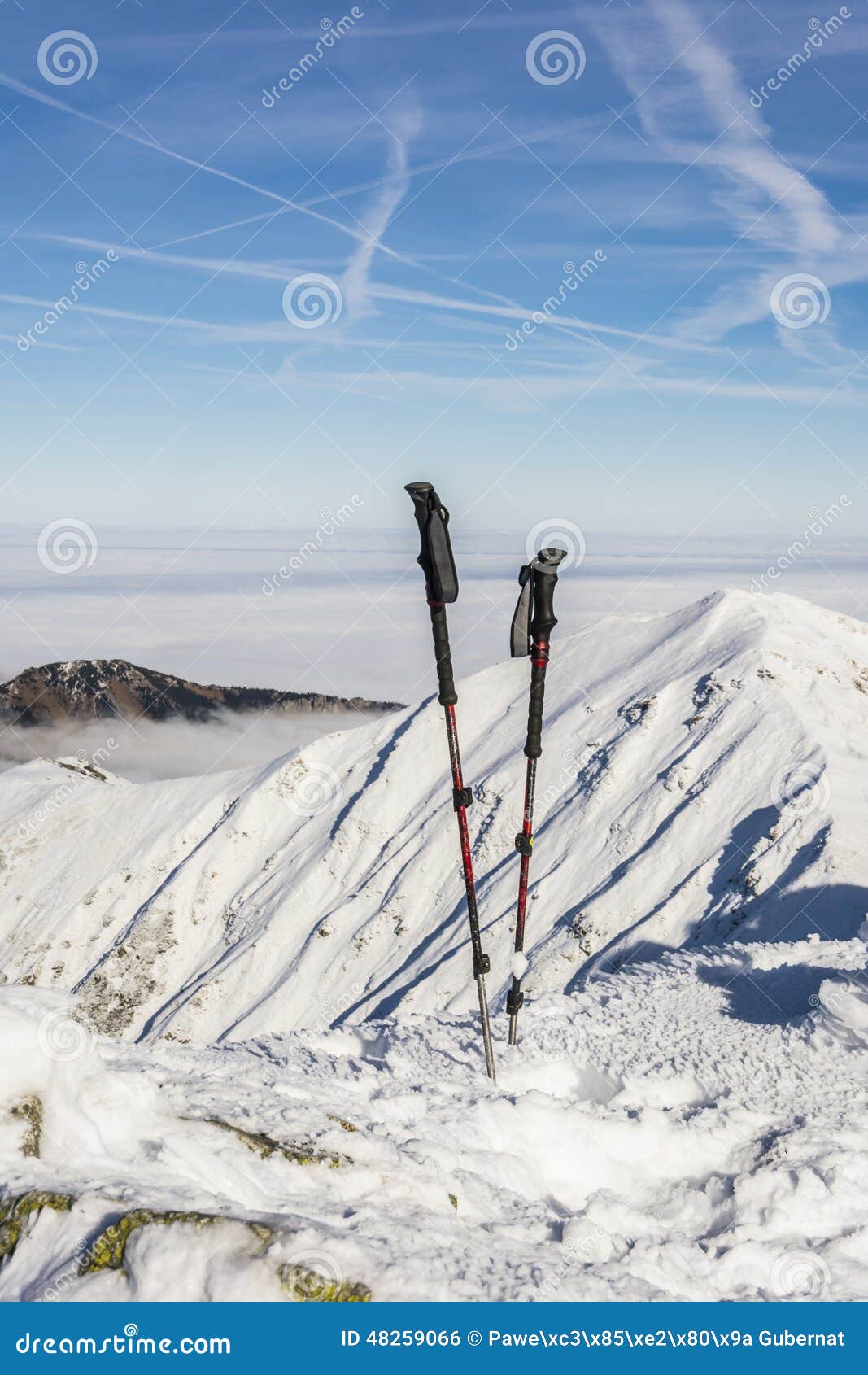Trekking poles in the snow stock photo. Image of granite 48259066