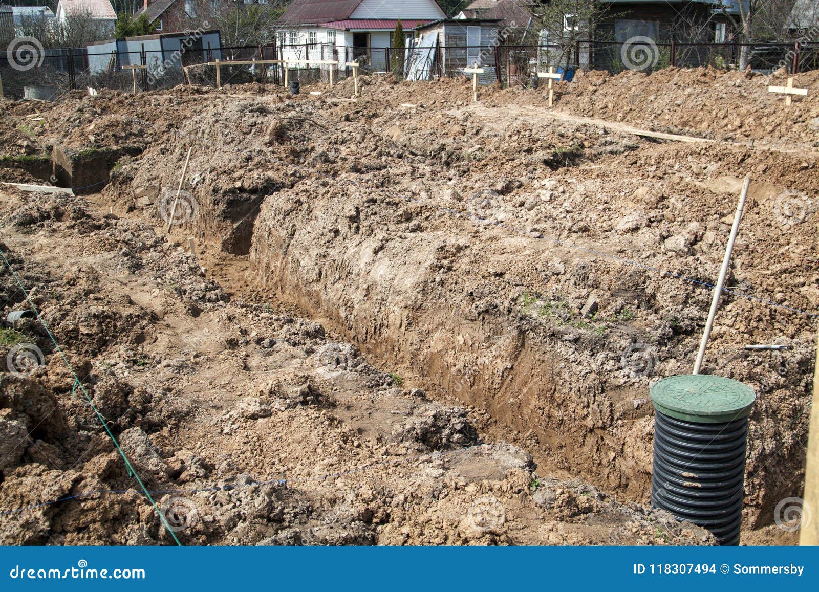 Trench Dug by Hand Under the Foundation or for Laying Drainage Stock