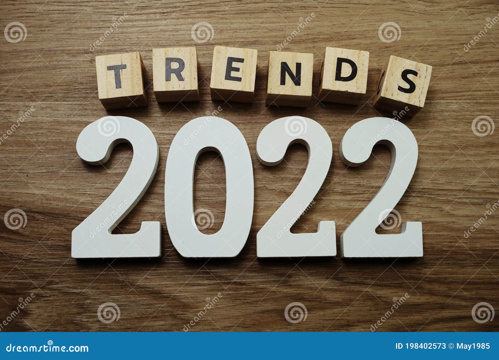 trends 2022 word alphabet letters on wooden background