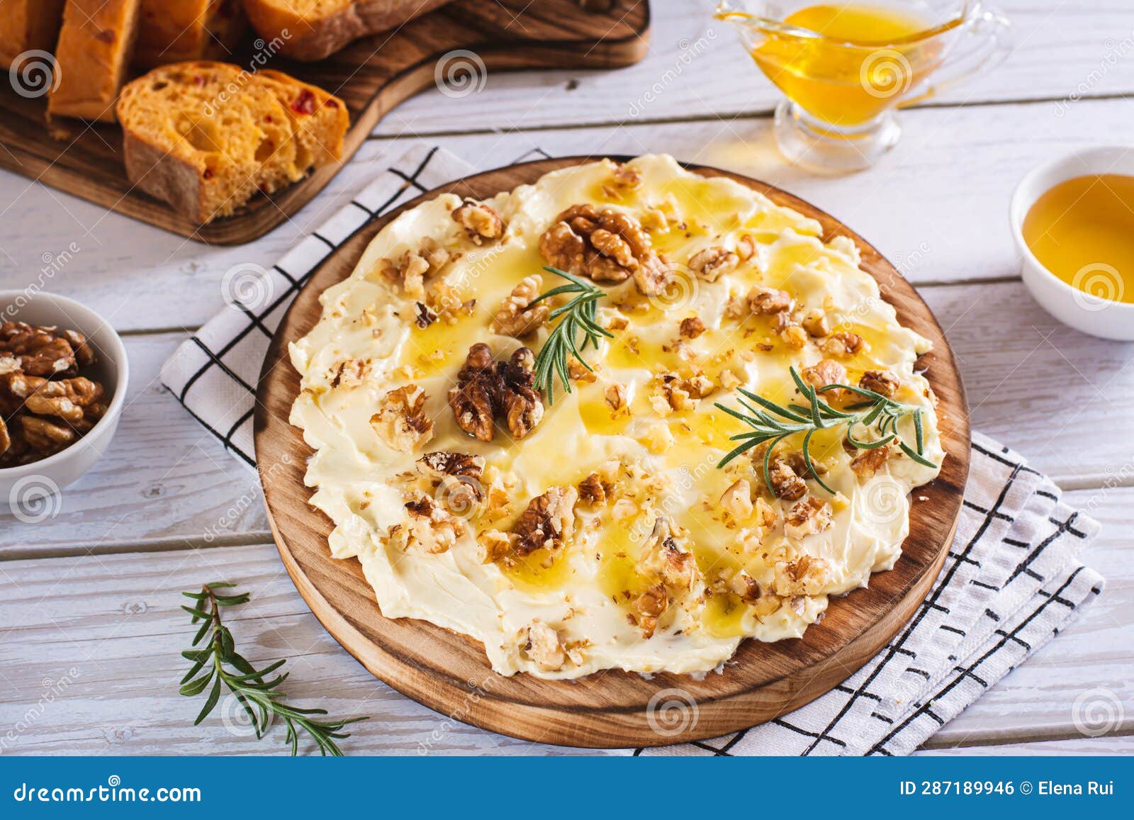 Trendy Butter Board with Honey and Walnuts for Breakfast on the Table