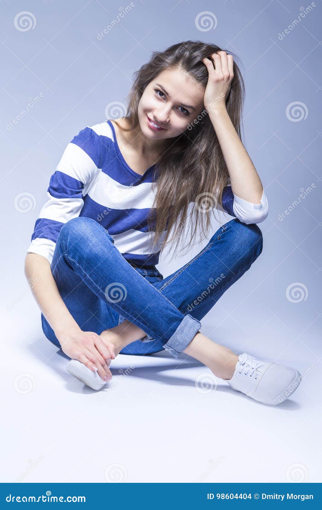 Trendy and Fashionable Positive Caucasian Brunette Girl Sitting on ...
